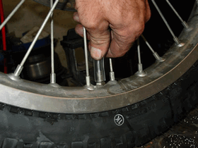 Thread completely down the valve stem