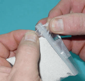 Removing the special clip from the EZ Open Bag